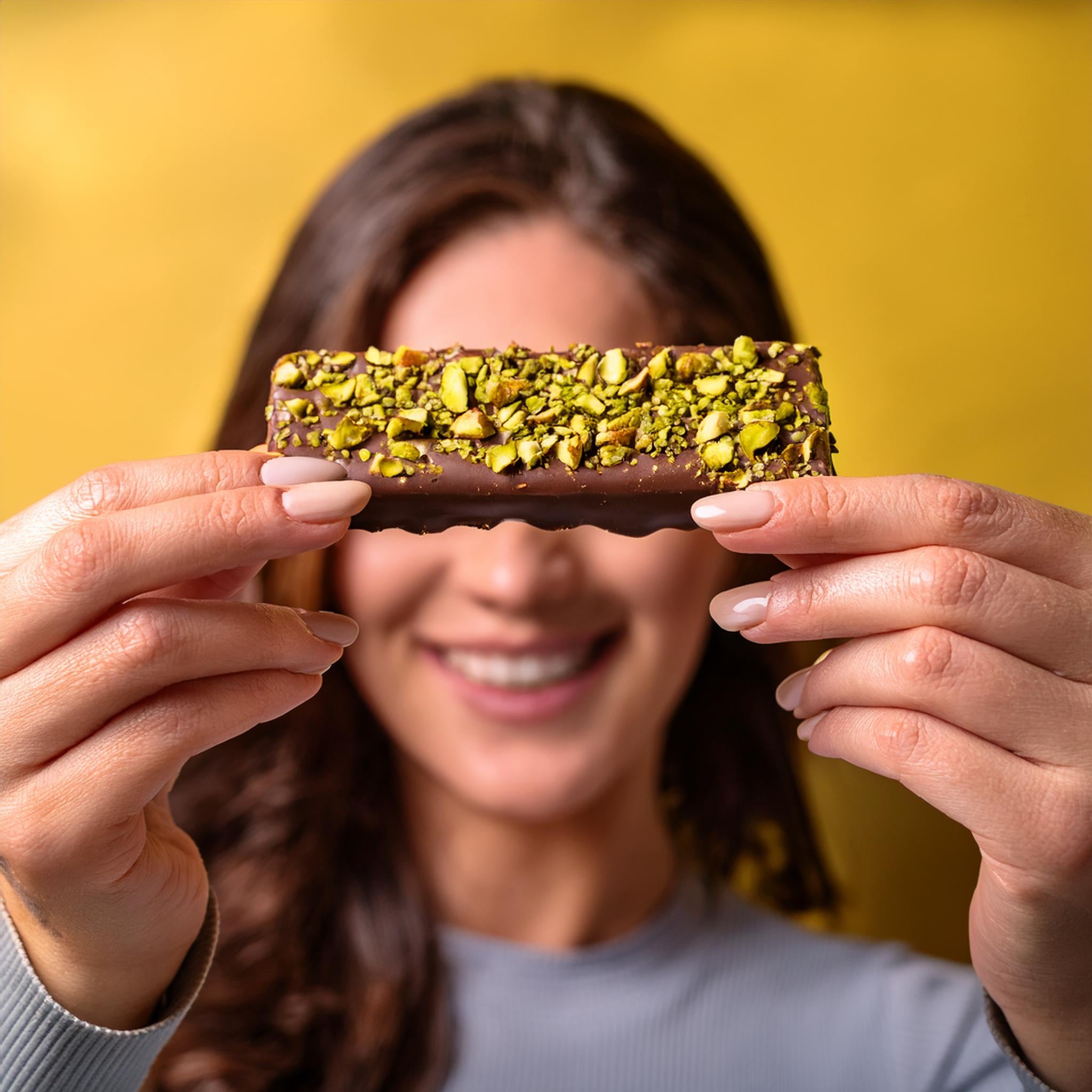 Barretta proteica spezzafame pistacchio e cioccolato